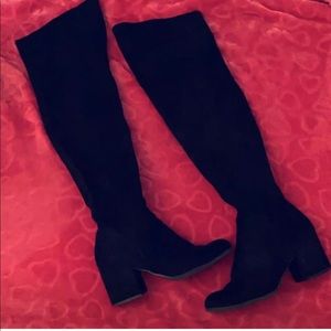 Thigh high black suede boots